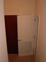 Washer/Dryer area (downstairs) and door to commercial space (1071K)