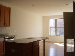 Kitchen looking into Living room (1433K)