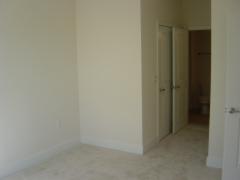 Bedroom looking into bath, closets (1277K)